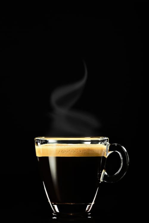 espresso-dark-background-steam-rises-coffee-coffee-breakfast-italian-cafe-shop-vertical-shot-selective-focus.jpg